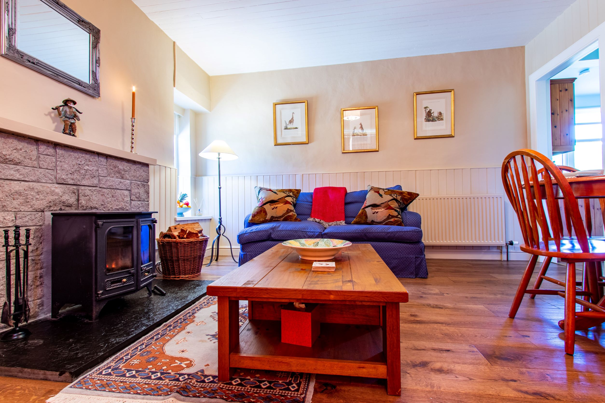 sitting-room-blue-sofa-wood-burning-stove